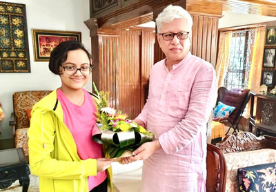 Chess prodigy Arshiya Das felicitated by Telangana Governor Jishnu Dev Verma at his residence in Agartala on November 13.